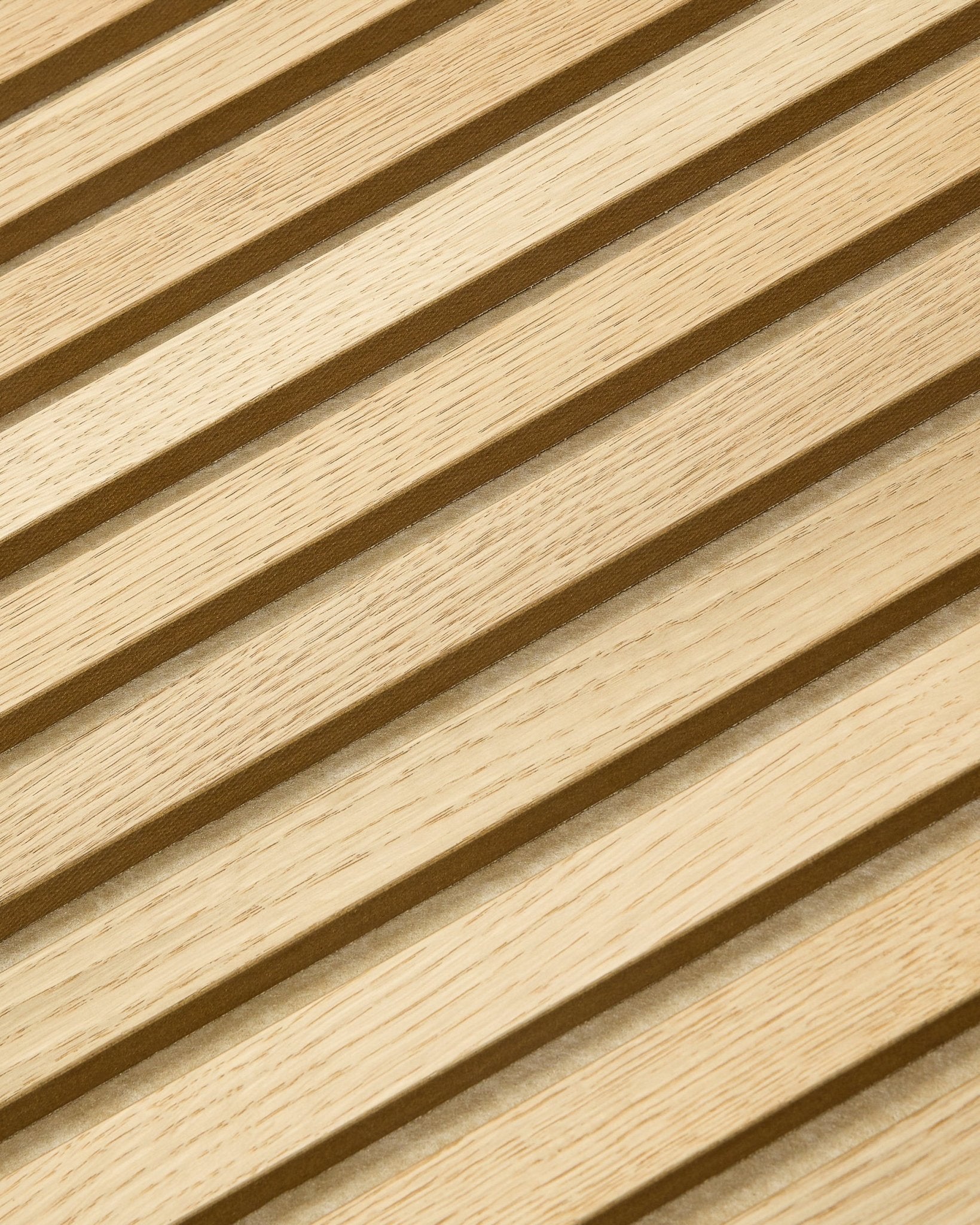 Close-up of WoodUpp Akupanel Tonal in Classic Oak, 240 x 60 cm, featuring diagonal light wood acoustic slats with a Nordic striped pattern.