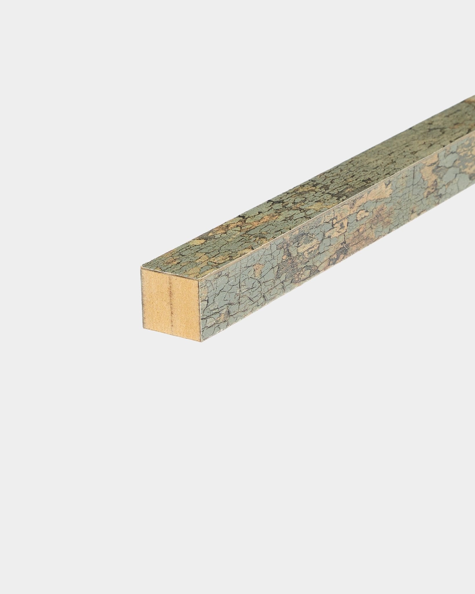 WoodUpp End Lamella in Oxide Grey, 2.2 cm: square MDF-framed rod with cracked greenish surface, designed as an end piece for Akupanel acoustic panels.