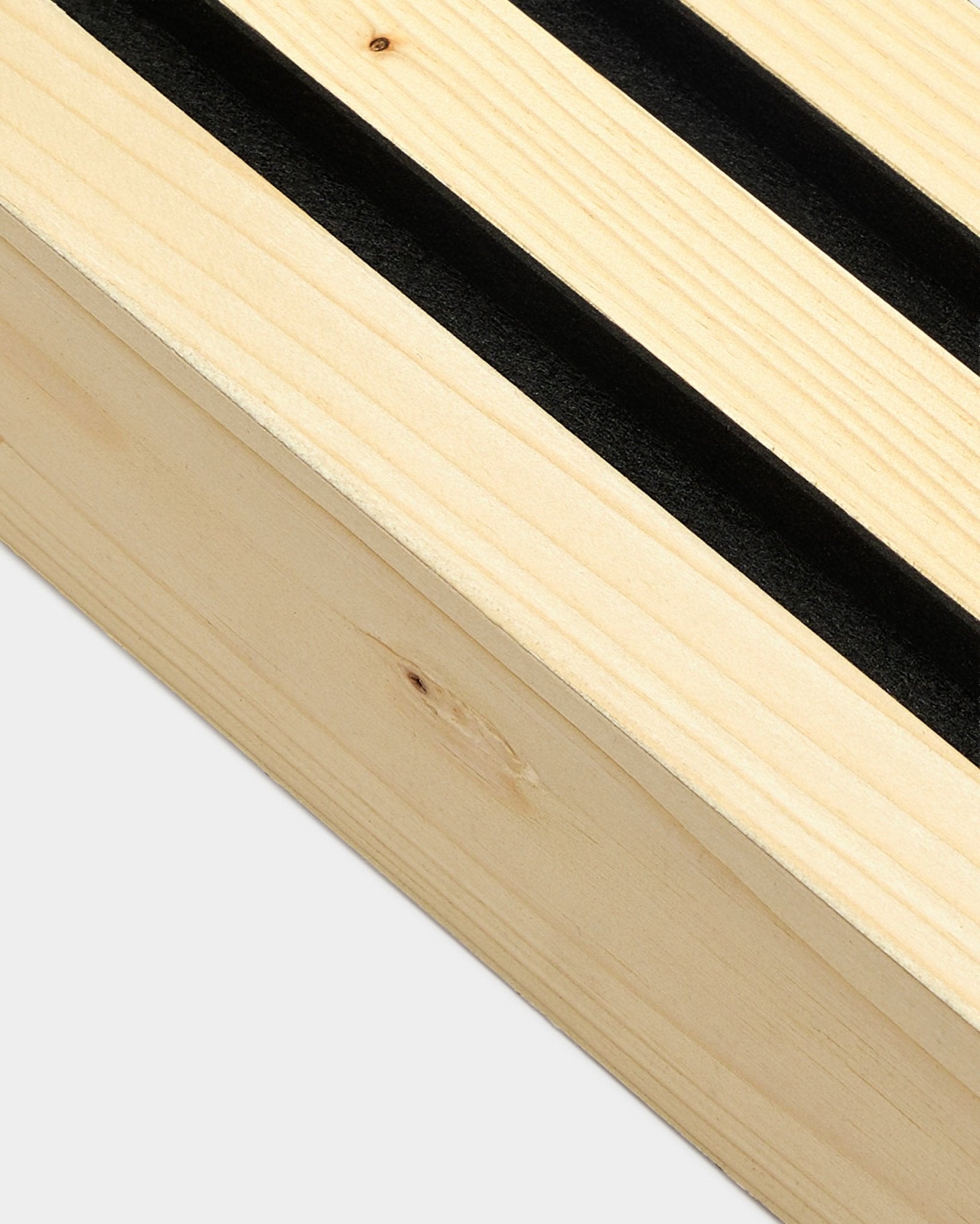 Close-up of WoodUpp end lamella in Alp finish, 6.7 cm wide, showing detailed wood grain; designed for Nordic acoustic panel wall or Akupanel installation.
