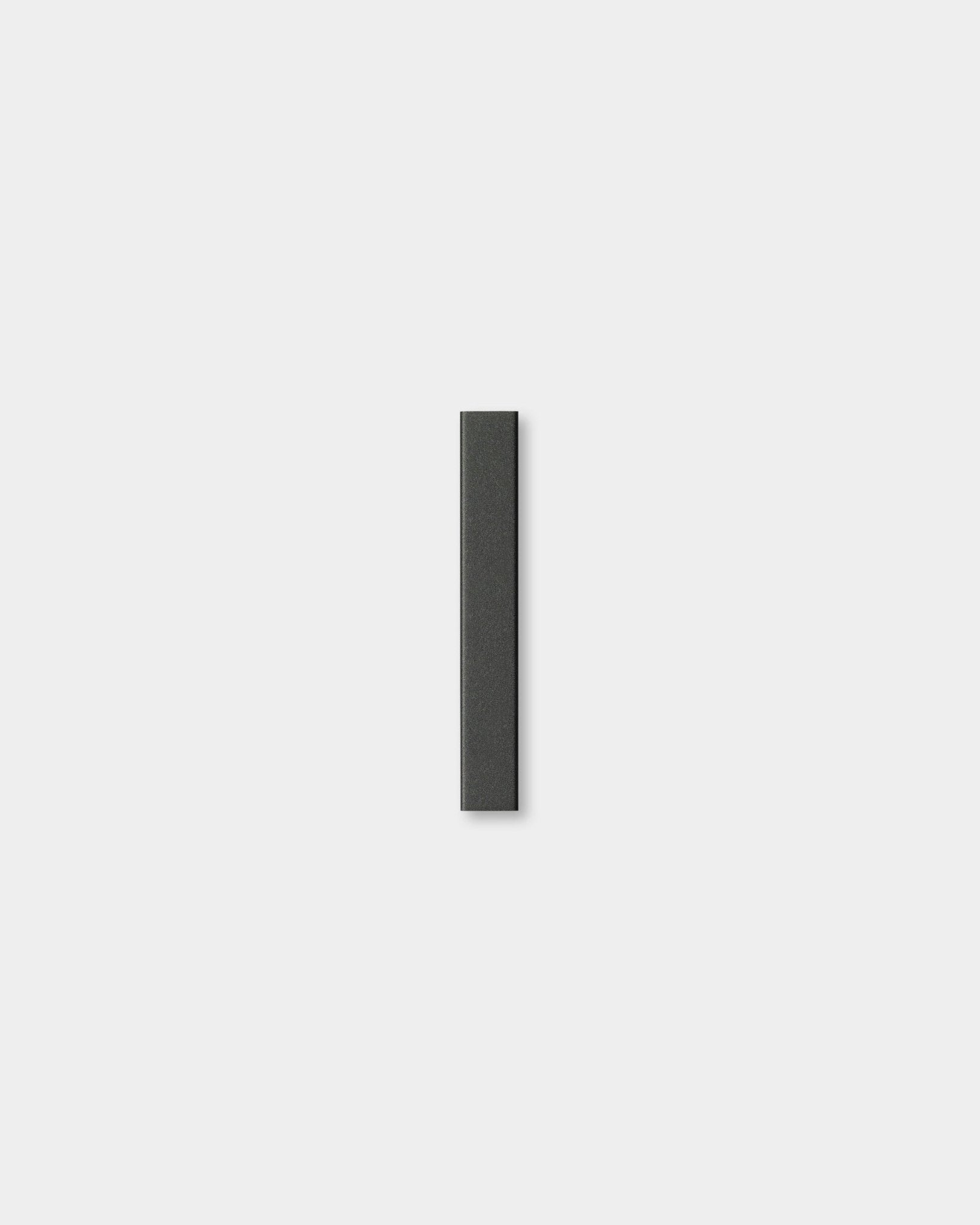The Liva | Cover by WoodUpp is a vertical 20 cm black aluminum cover, designed as an accessory for Akupanel, shown against a plain light gray background.
