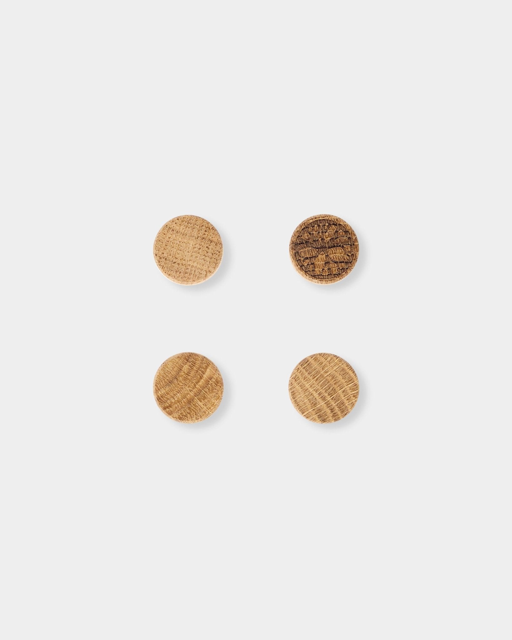 WoodUpp Norr Magnet set of 4 in natural oak, showing distinct wood grain, designed as accessories for use with the Norr Magnetic acoustic panel.