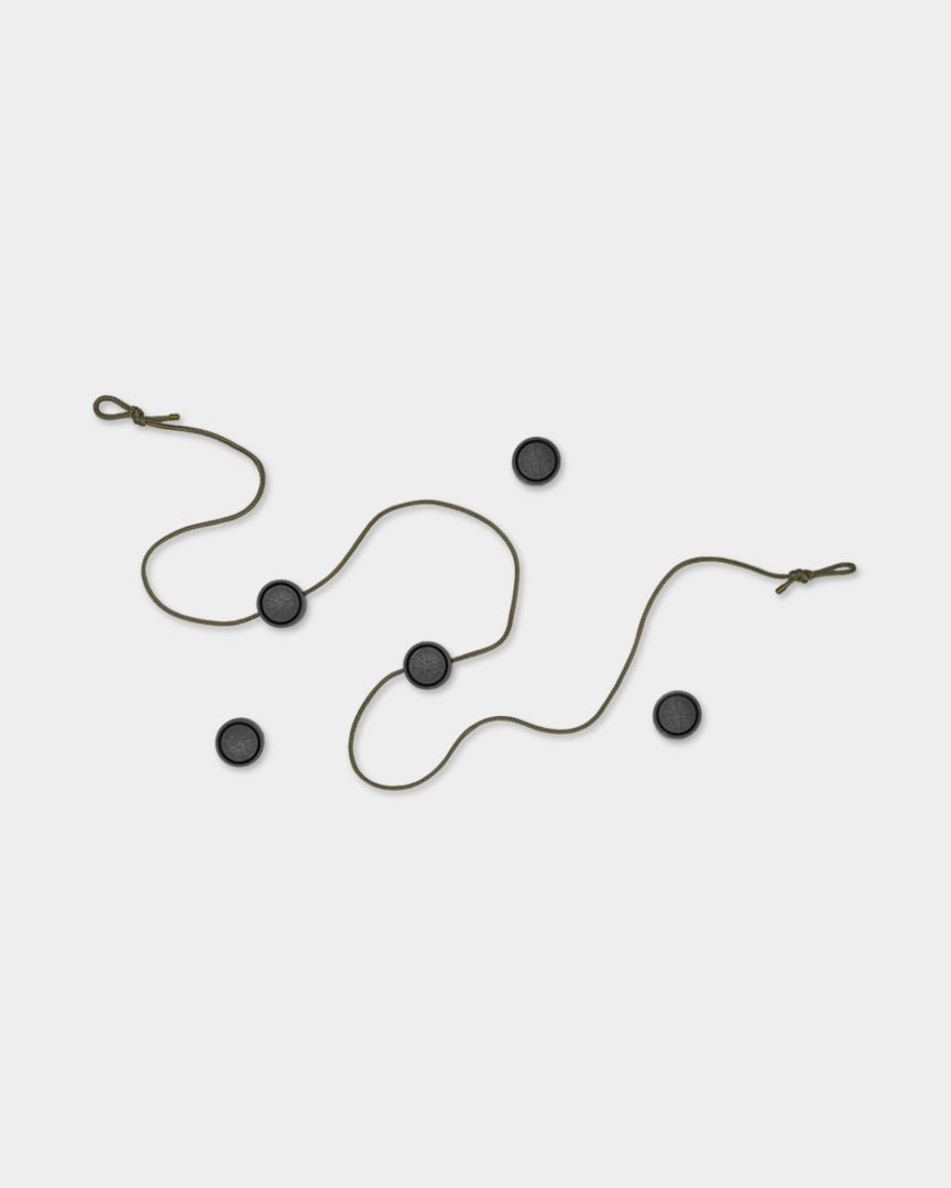 The Vindar | Gallery String by WoodUpp features a brown cord with magnetic clips and four black circles, displayed on a light gray background.