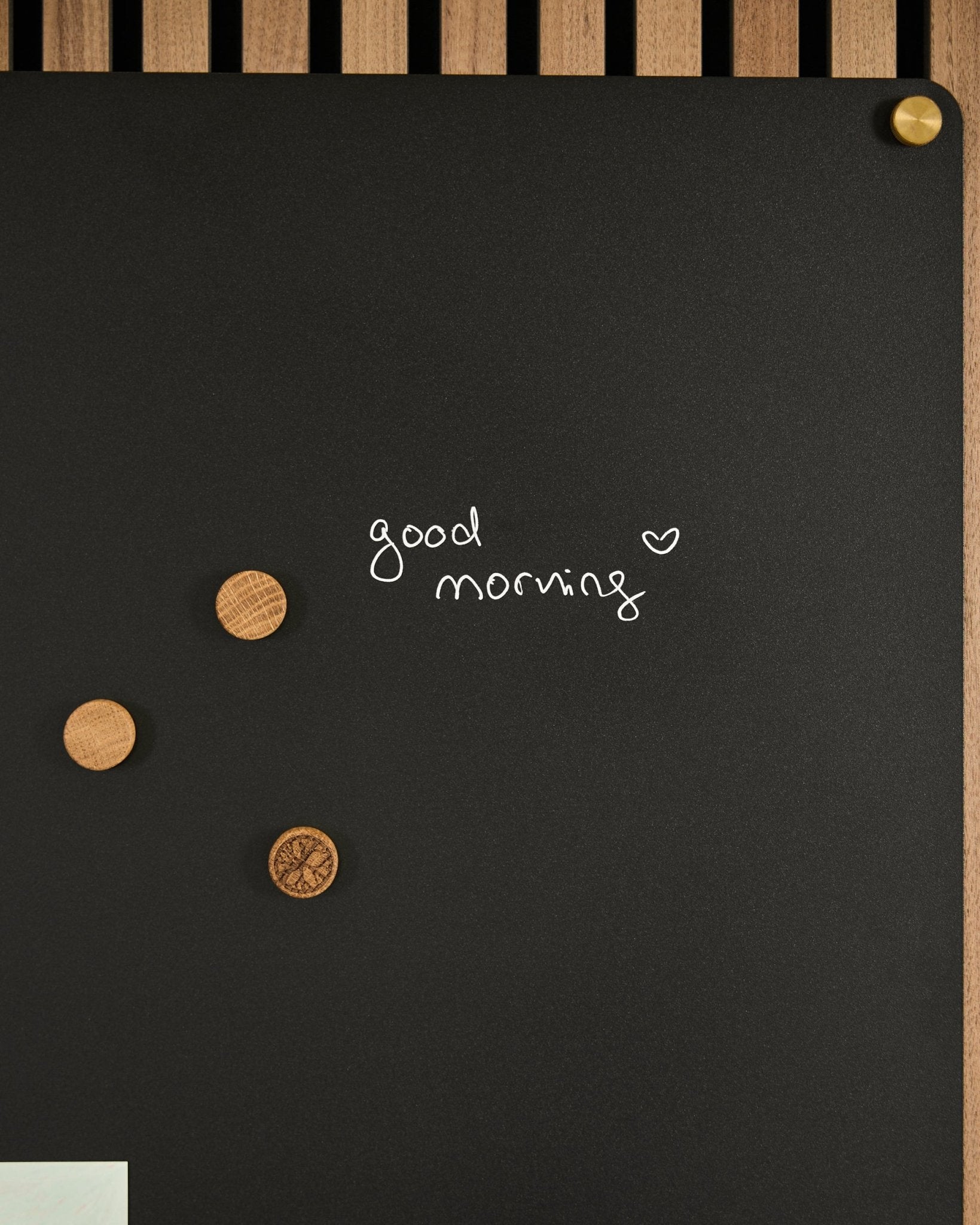 The Norr | Blackboard set by WoodUpp features a black acoustic panel with good morning and a heart, plus 3 wooden magnets. Nordic minimalist design.
