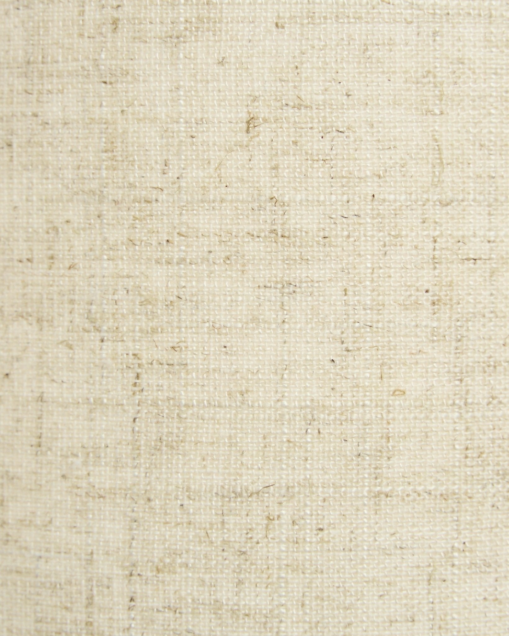Close-up of the Feya wall lamp by WoodUpp in beige tones, featuring textured fabric shade with a natural linen-cotton appearance. Nordic minimalist design.