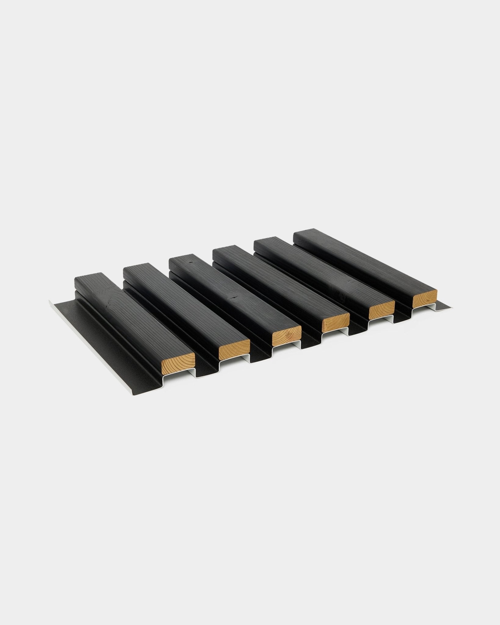 Aluwood facade panel sample by WoodUpp with six wooden slats set in black metal channels, measuring 45.7x27 cm, displayed on a light gray background.