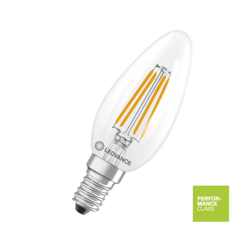 WoodUpp E14 LED candle bulb, 3.4W, 470 lm; clear glass with visible filaments, silver screw base, and green Performance Class label.